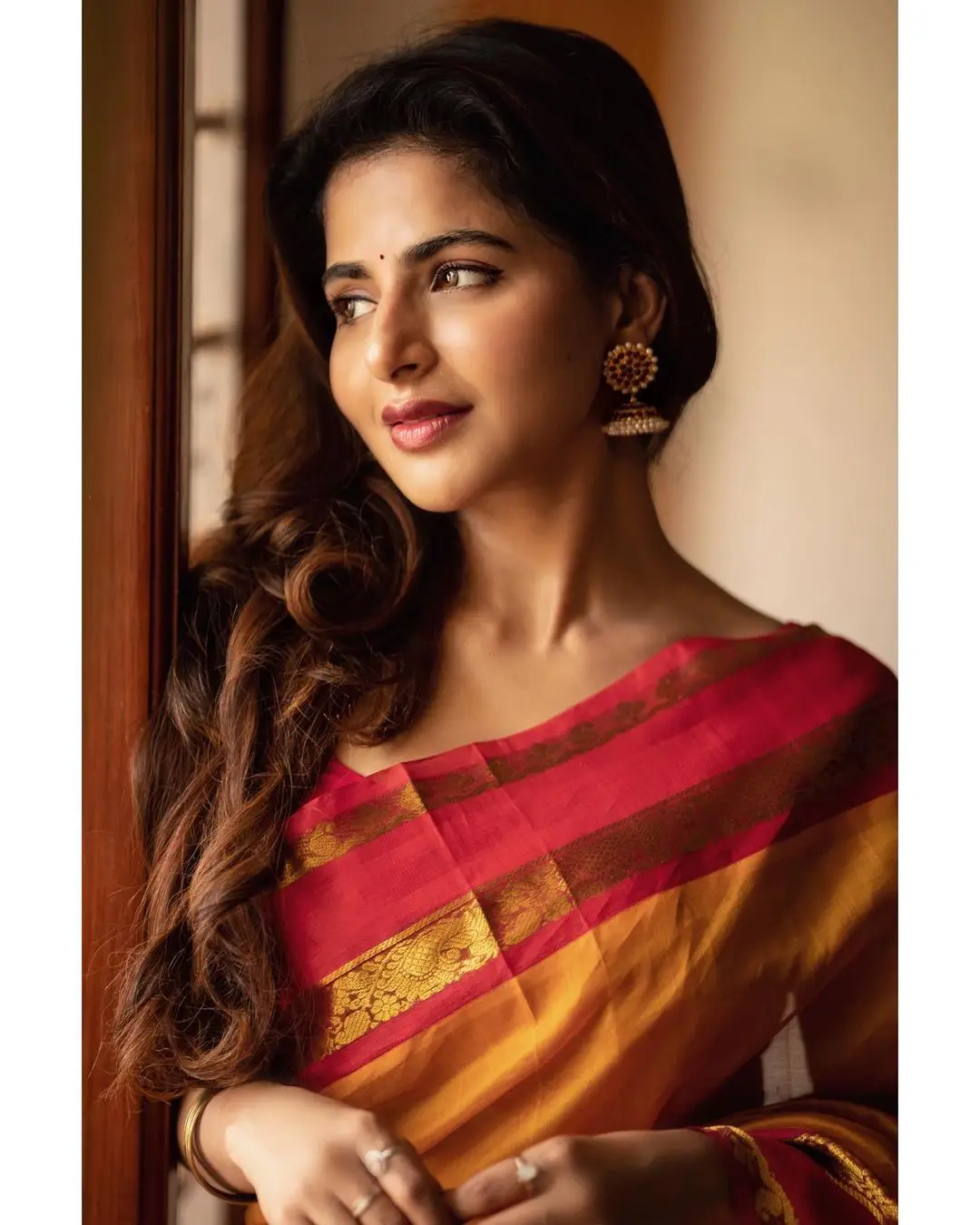 Indian Girl Iswarya Menon In Traditional Orange Saree Sleeveless Blouse